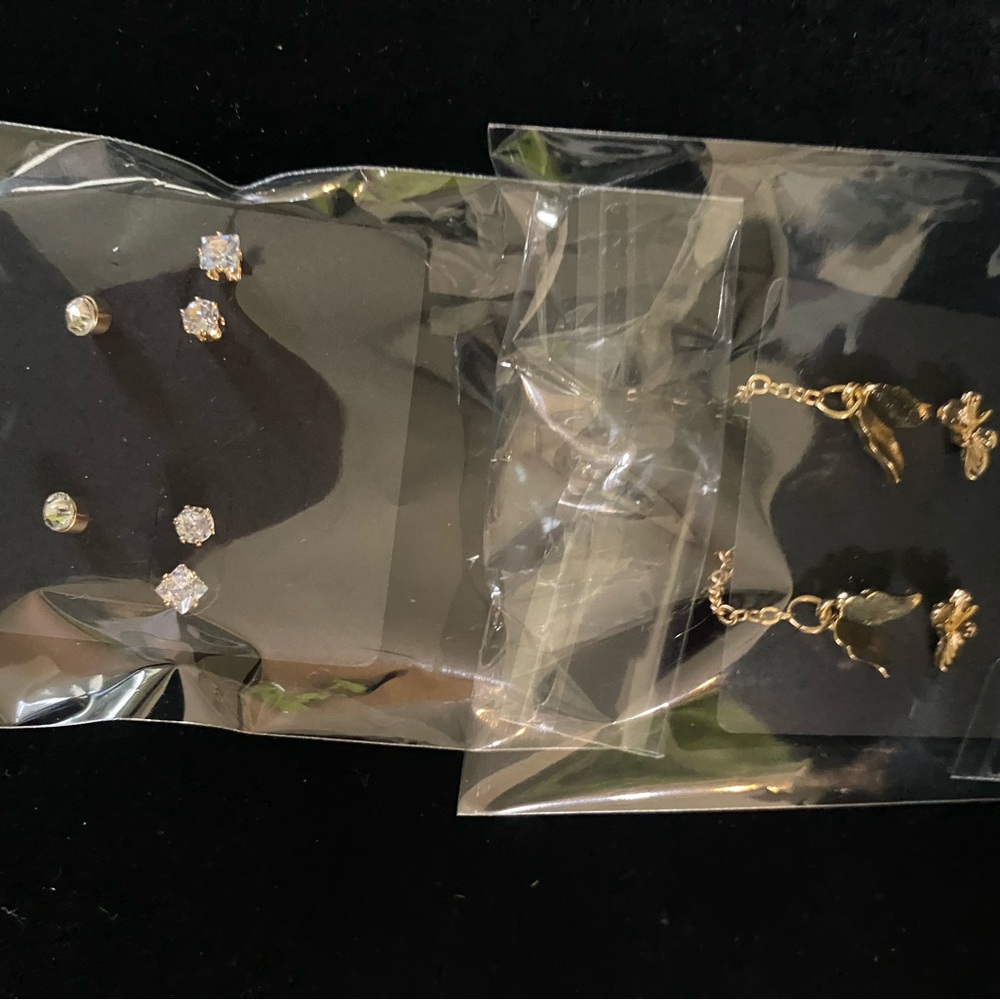 Gold and Silver Stud Earrings with Delicate Design